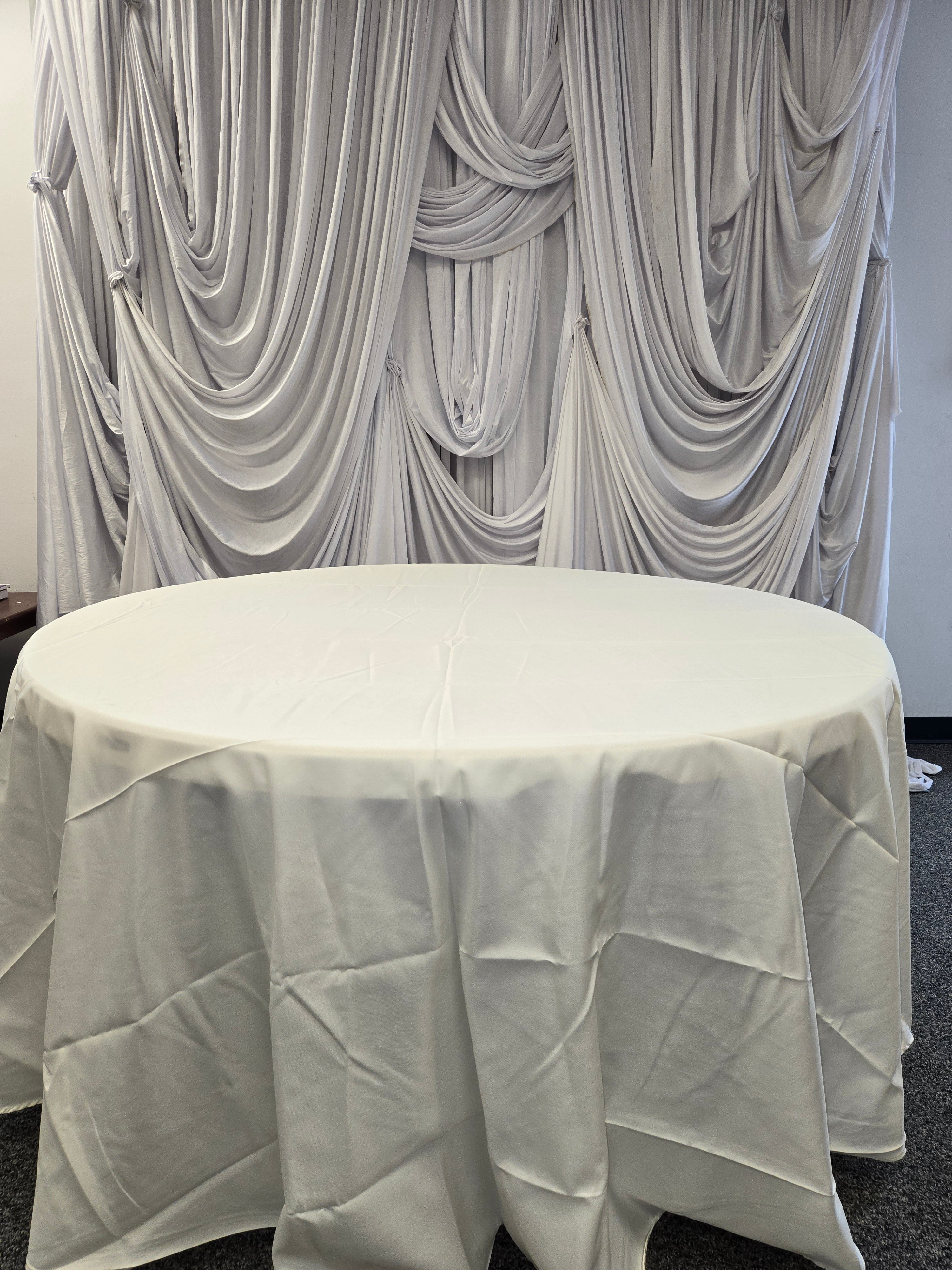 Ivory Polyester Round Table Cover 120"